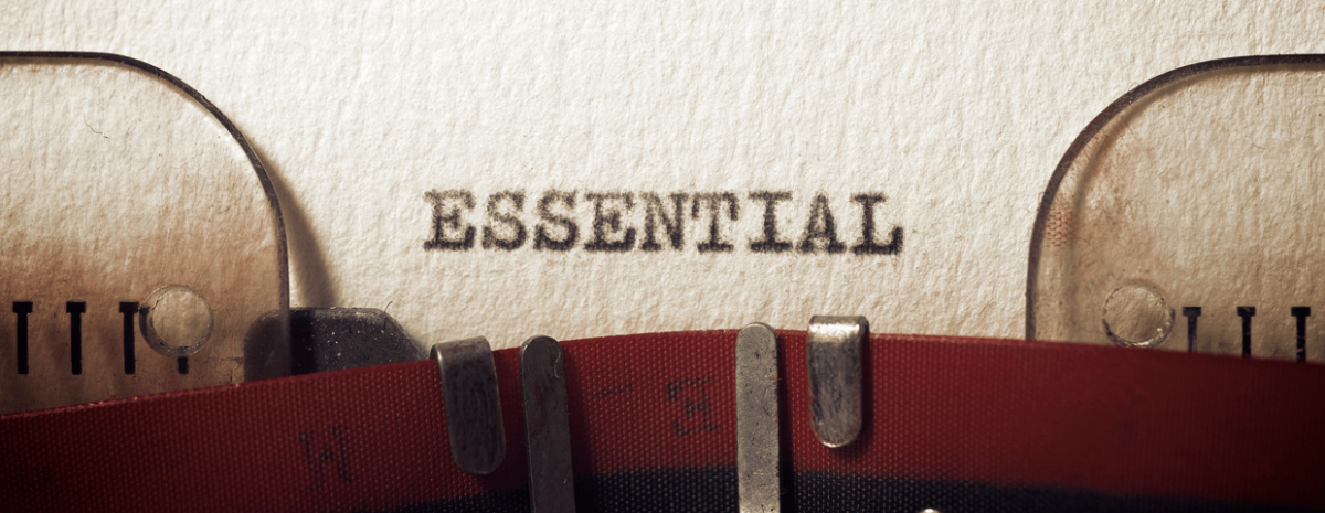 The word essential typed out with a typewriter